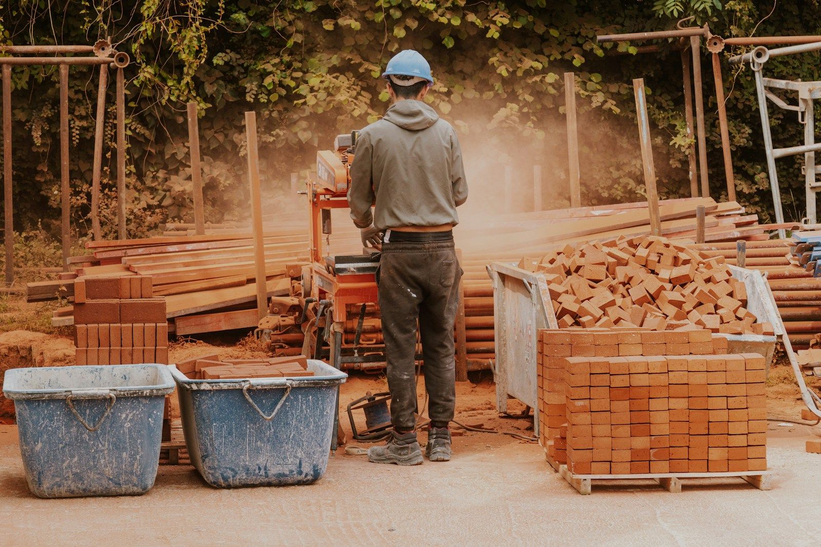 Contractor on a job site wearing a hard hat